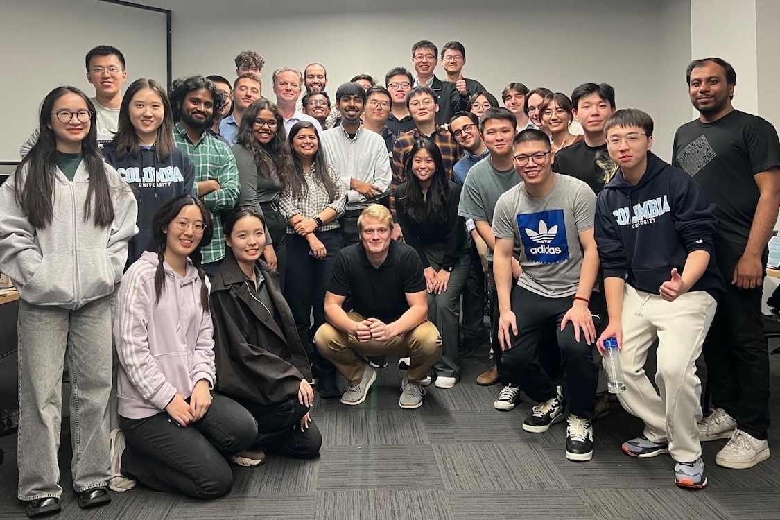 34 people posing for a photo