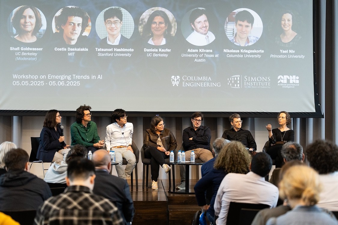 Workshop on Emerging Trends in AI panelists sitting on stage, from left to right: Shafi Goldwasser, Costis Daskalakis, Tatsunori Hashimoto, Daniela Kaufer, Adam Klivans, Nikolaus Kriegeskorte, Yael Niv