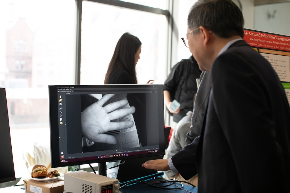 Dean Shih-Fu Chang tries out a demonstration.
