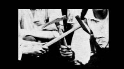 Two engineers holding picks