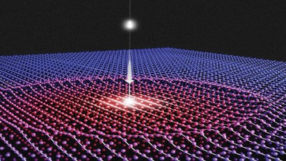 THE IMAGE SHOWN ILLUSTRATES THE ABSORPTION OF A LASER PHOTON INITIATING A SMALL CHANGE THAT PROPAGATES THROUGH THE MATERIAL OVER TIME, RATHER THAN INSTANT- ANEOUSLY CHANGING THE WHOLE MATERIAL.