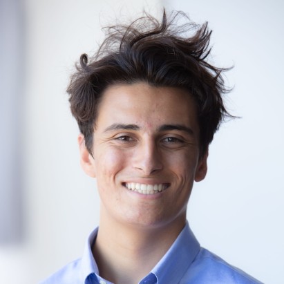 headshot of juan andres zuniga