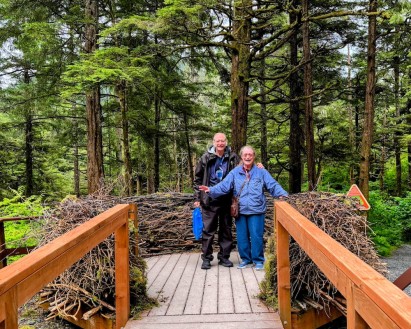 Bill Quirk and partner, posing in the woods