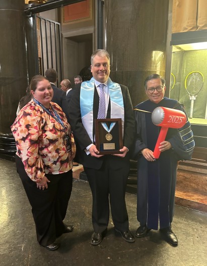 John Mullervy pictured with his wife Stephanie (left) and Dean Shih-Fu Chang (right)