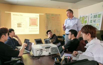 Peter Kinget and students conduct a chip design review  in Spring 2025.