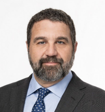 headshot of Dean Dakolias