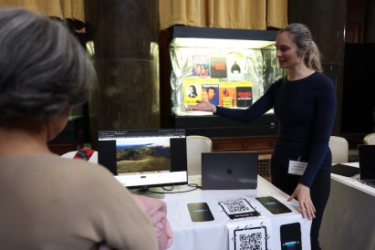 Computer Science Associate Professor Lydia Chilton (right) at the event’s Demo Expo