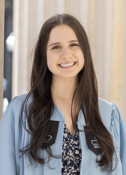 Danielle Maydan in a Columbia graduation robe